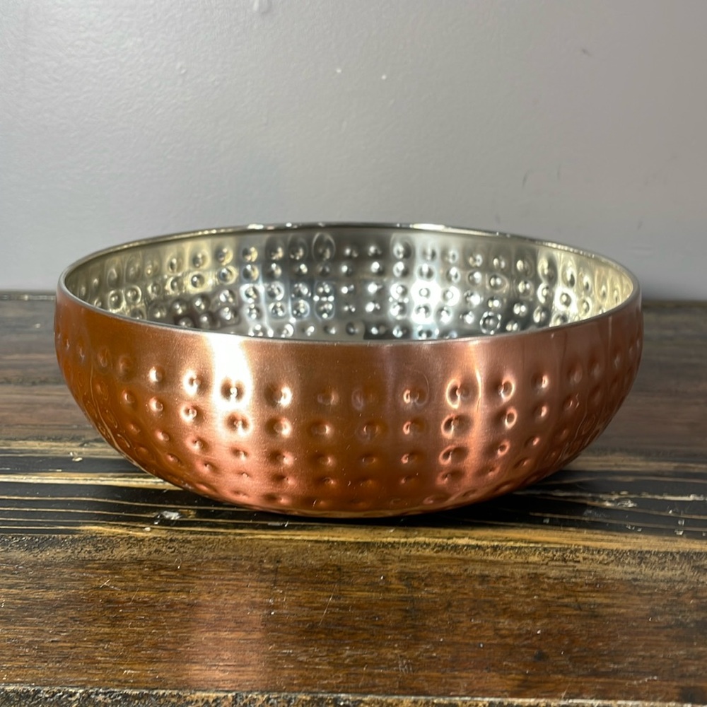Hammered copper appearing bowl with silver interior 8 1/2”
